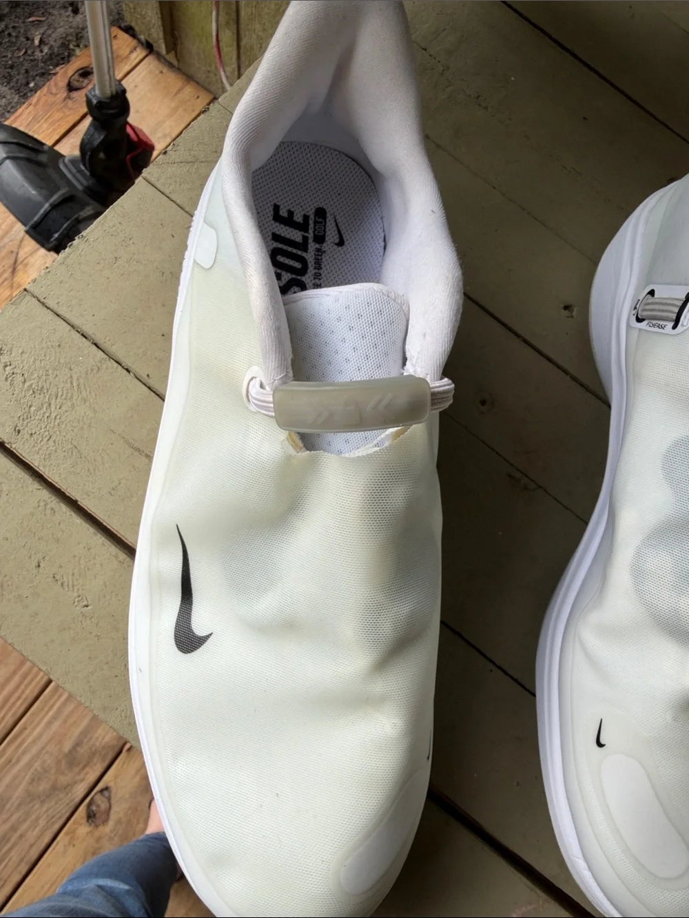 Nike Men’s White Slip-On Sneakers with Black Swoosh